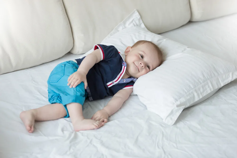 When Can a Baby Sleep With a Pillow? Baby Sleep Safety 1 When Can a Baby Sleep With a Pillow