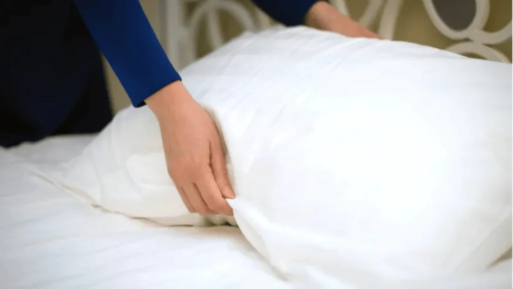 Fluffing feather pillows
