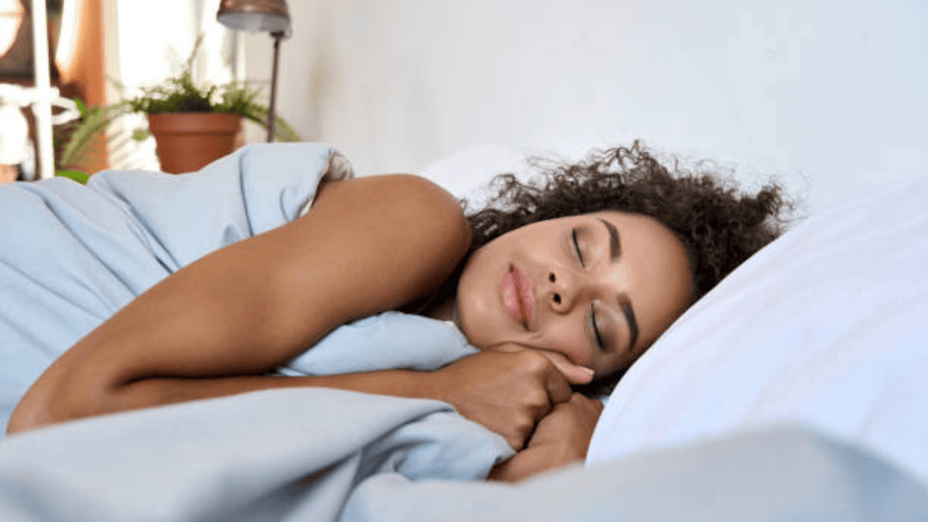 woman sleeping peacefully in bed